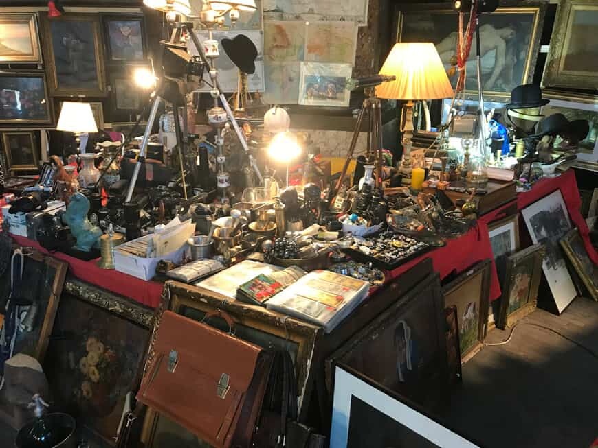 antiques stand in the market with vintage products